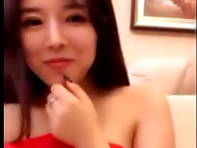 Beautiful chinese girl showing boobs